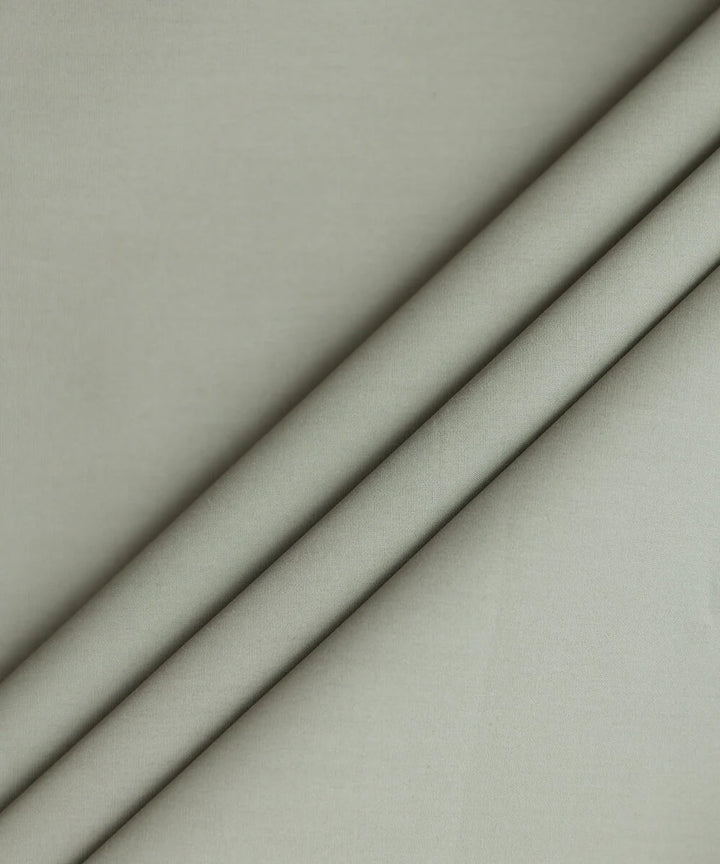 Close-up of beige fabric with a subtle texture